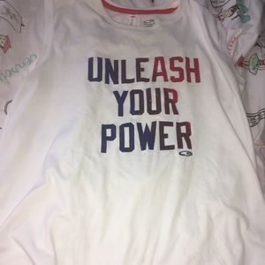 White tank top with red white and blue lettering